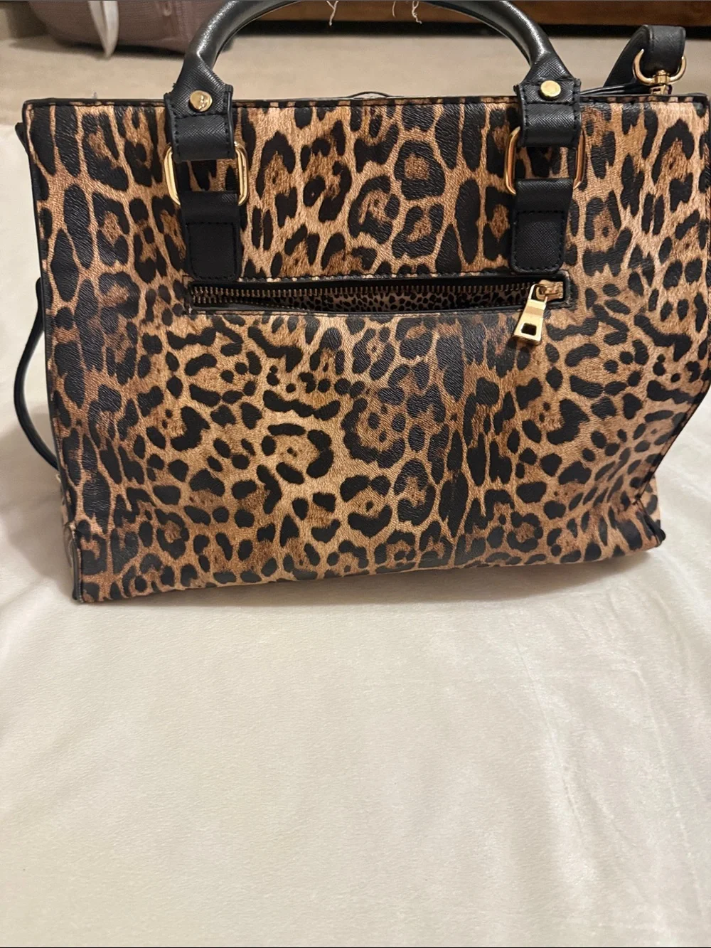 Leopard Print Tote Bag with Black Handles and Gold Hardware. The wallet included
